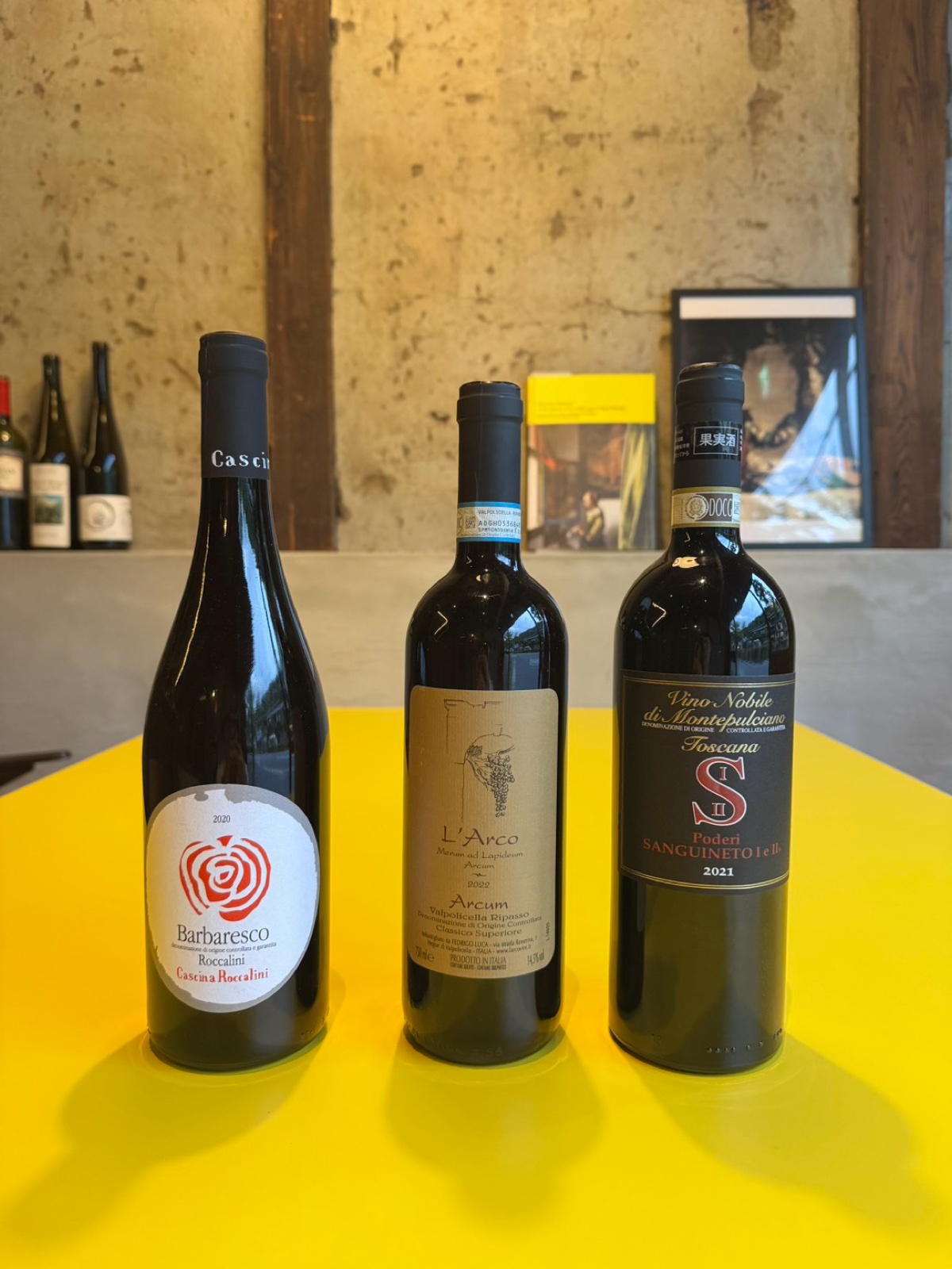 Three Italian reds newly arrived at Bello Vero: Cascina Roccalini Barbaresco 2020, L'Arco Arcum Valpolicella Ripasso 2022, and Poderi Sanguineto Vino Nobile di Montepulciano 2021